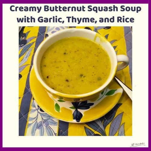 An image of a bowl of Creamy Butternut Squash Soup with garlic and rice