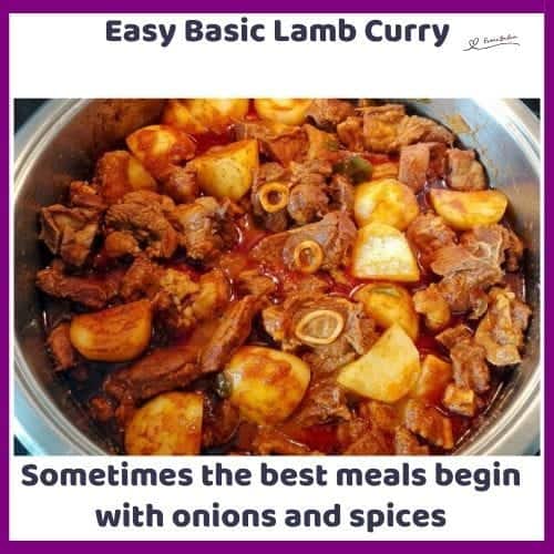 An image of A Lamb Curry with potato in a stainless pot