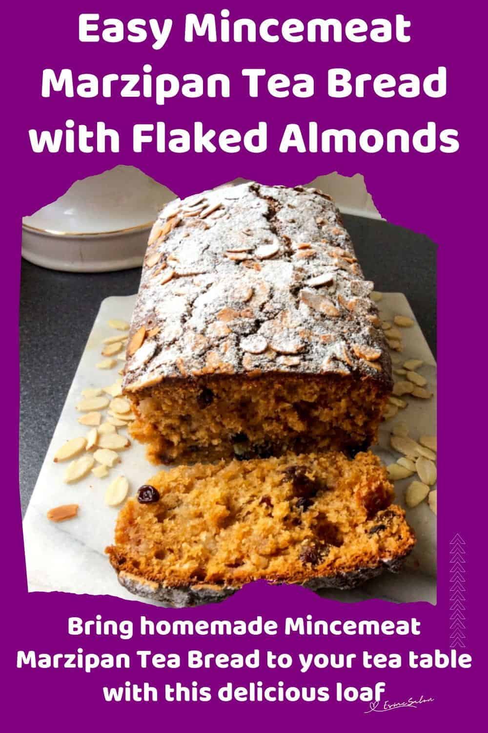 An image of a Mincemeat Marzipan Tea Bread with flaked almonds and dusted with icing sugar