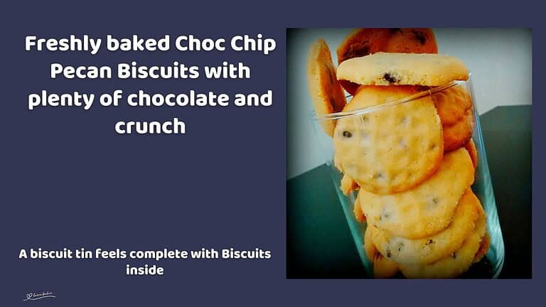 An image of Choc Chip Pecan Biscuits stacked in a glass
