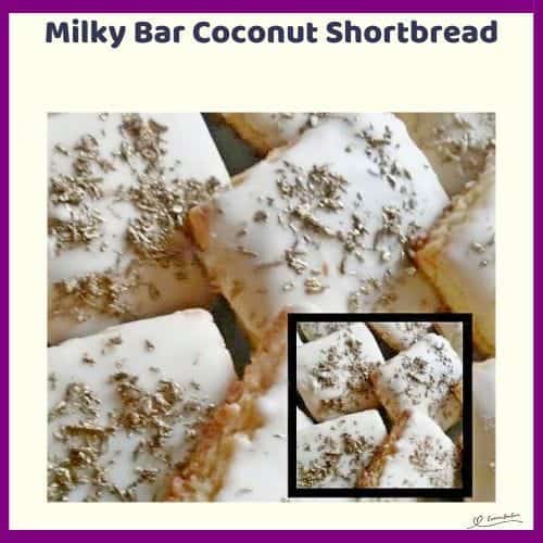 An image of a Classic Milky Bar Coconut Shortbread Biscuit dipped in white chocolate