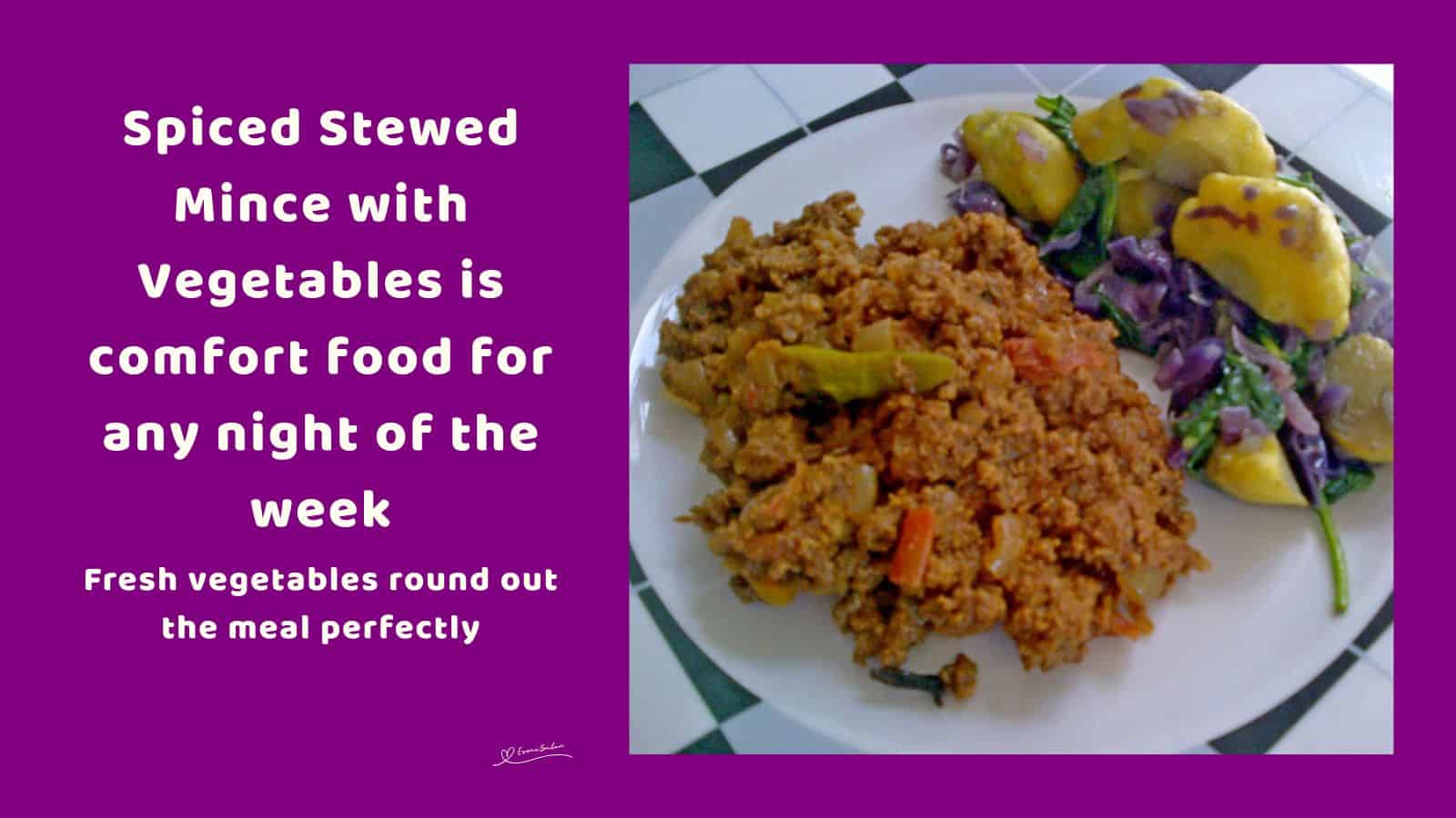 An image of a plate with Spiced Stewed Mince with potatoes and red cabbage