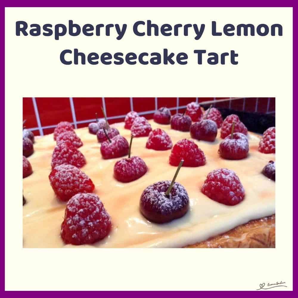An image of a Raspberry Cherry Lemon Cheesecake Tart