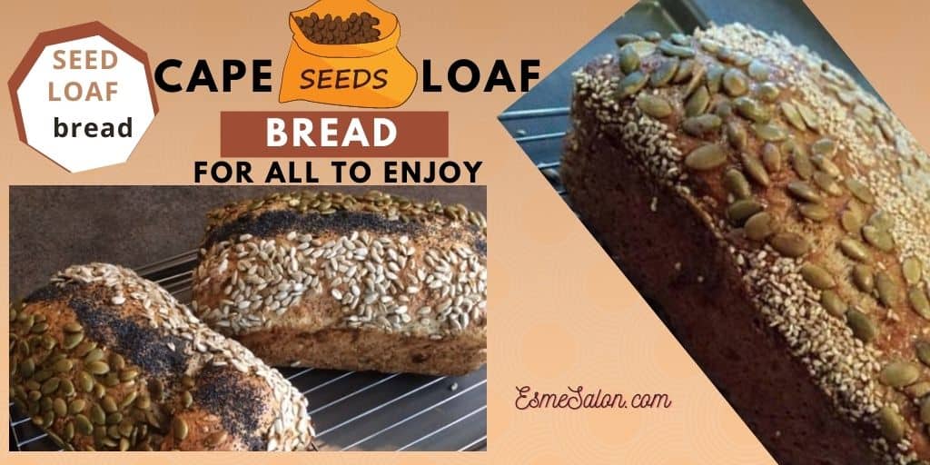Two Cape Seed Loaves with pepitas, black poppy seeds, and sunflower seed lines on the top on cooling rack