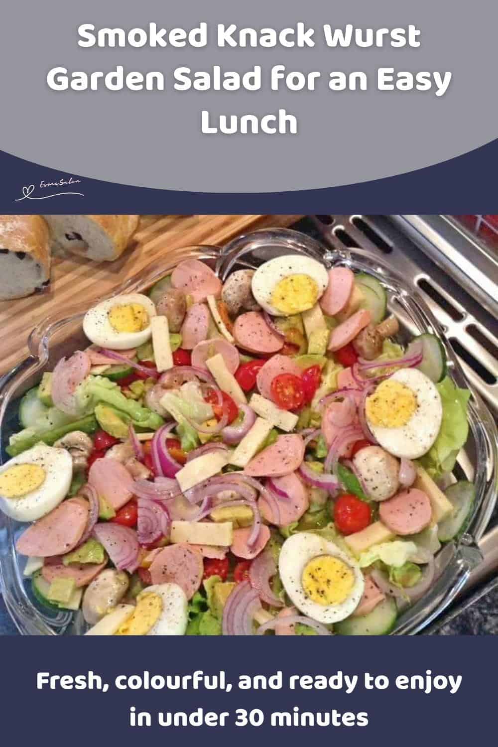 An image of a plate with Smoked Knack Wurst Garden Salad, with Creamy Avocado and Emmenthal Cheese