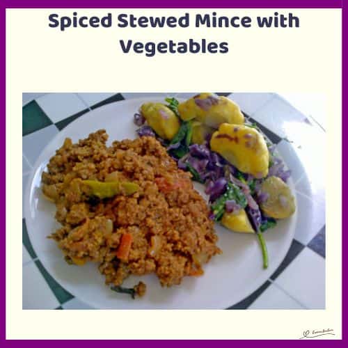 An image of a plate with Spiced Stewed Mince with potatoes and red cabbage