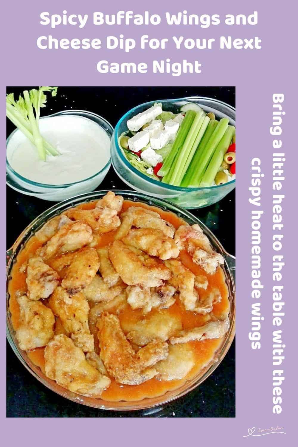 An image of Spicy Buffalo Wings and a Blue Cheese Dip served with celery sticks