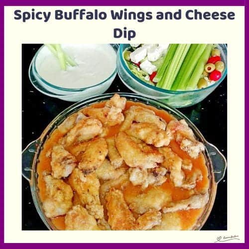 An image of Spicy Buffalo Wings and a Blue Cheese Dip served with celery sticks