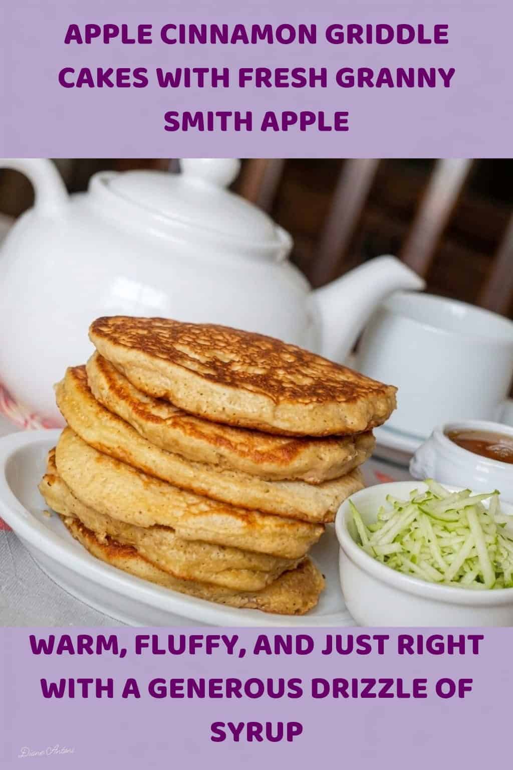 An image of a stack of Apple Cinnamon Griddle Cakes with Granny Smith apple, cinnamon powder and syrup next to a tea pot and a tea cup