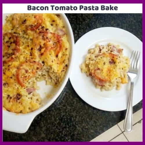 An image of a dish of Bacon Tomato Pasta Bake with three different cheeses