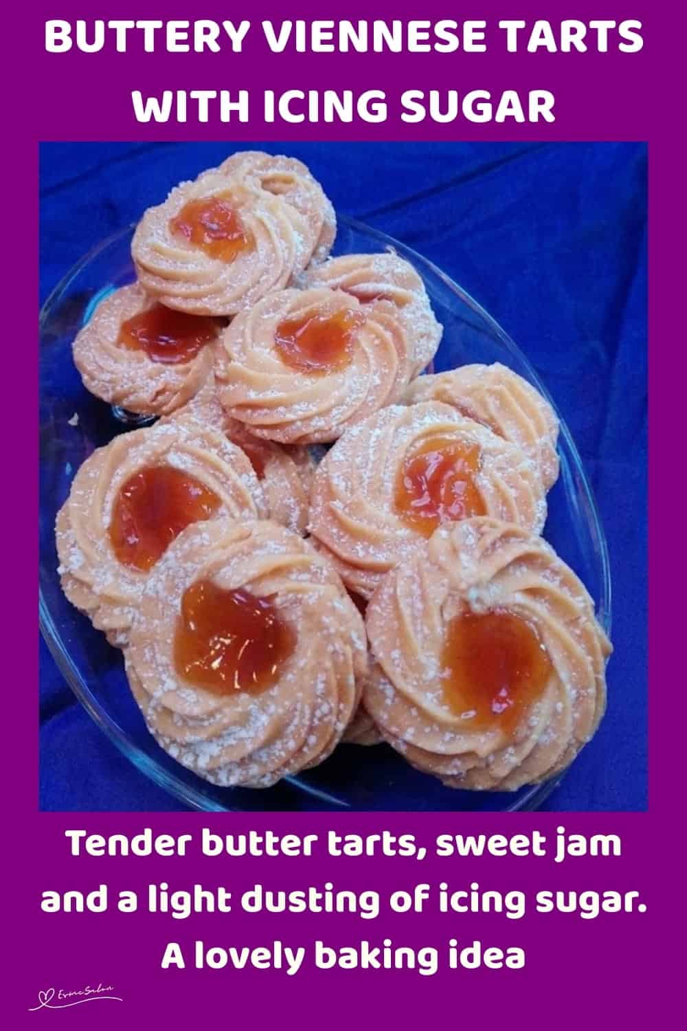 An image of Buttery Viennese Tarts, with jam centers and a dusting of icing sugar