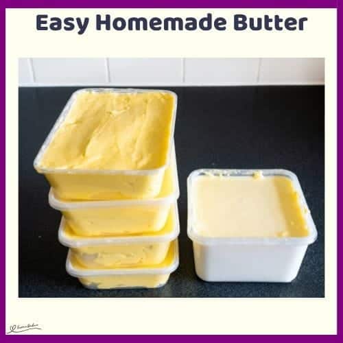 An image of Homemade Butter in tubs and some with fresh herbs