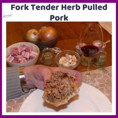 An image of slow-cooked Herb Pulled Pork on a bread roll with a glass of red wine in the background