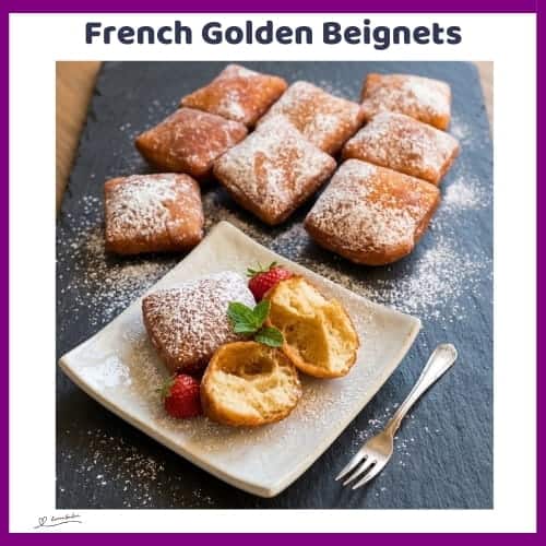 An image of a plate filled with French Golden Beignets with orange zest and Icing sugar