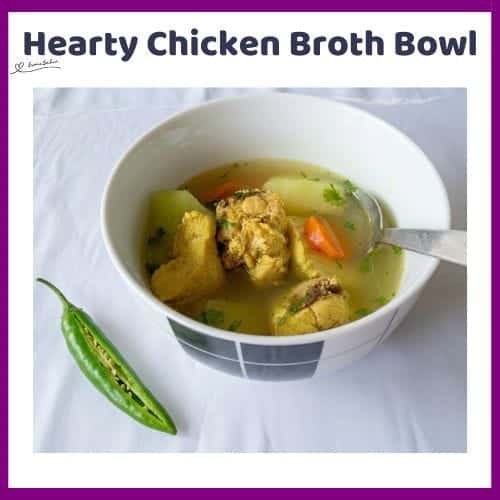 An image of a bowl of Hearty Chicken Broth Bowl with ginger, fennel, chili and potato