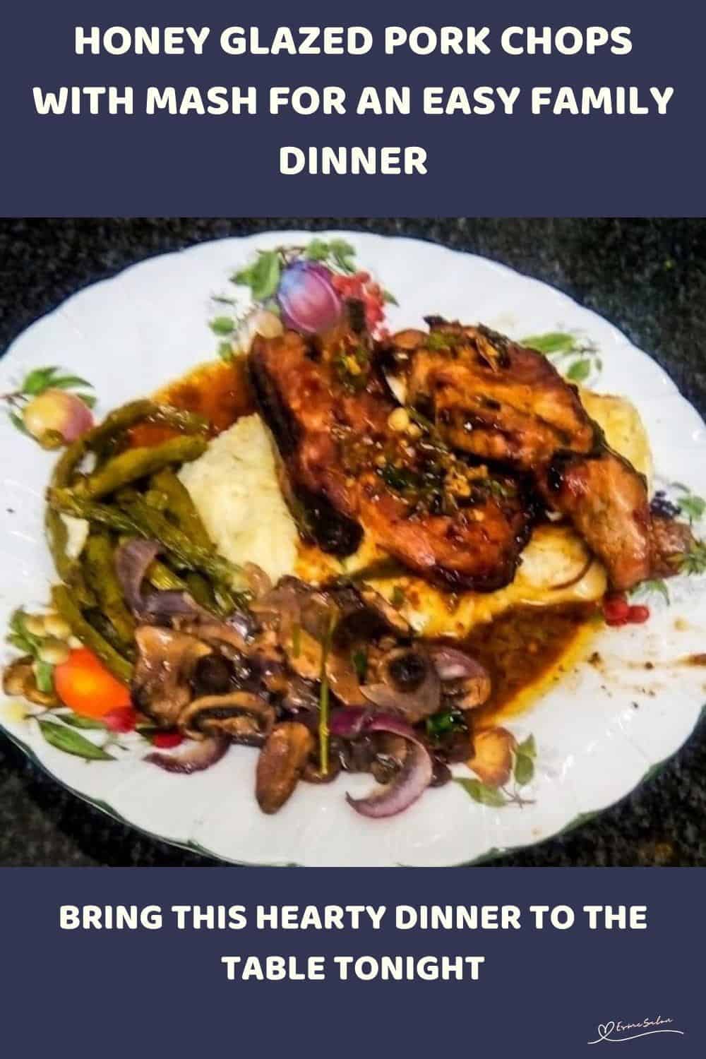 An image of a plate with Honey Glazed Pork Chops with creamy potatoes, Garlic Butter Green Beans and Mushrooms and Red Onions