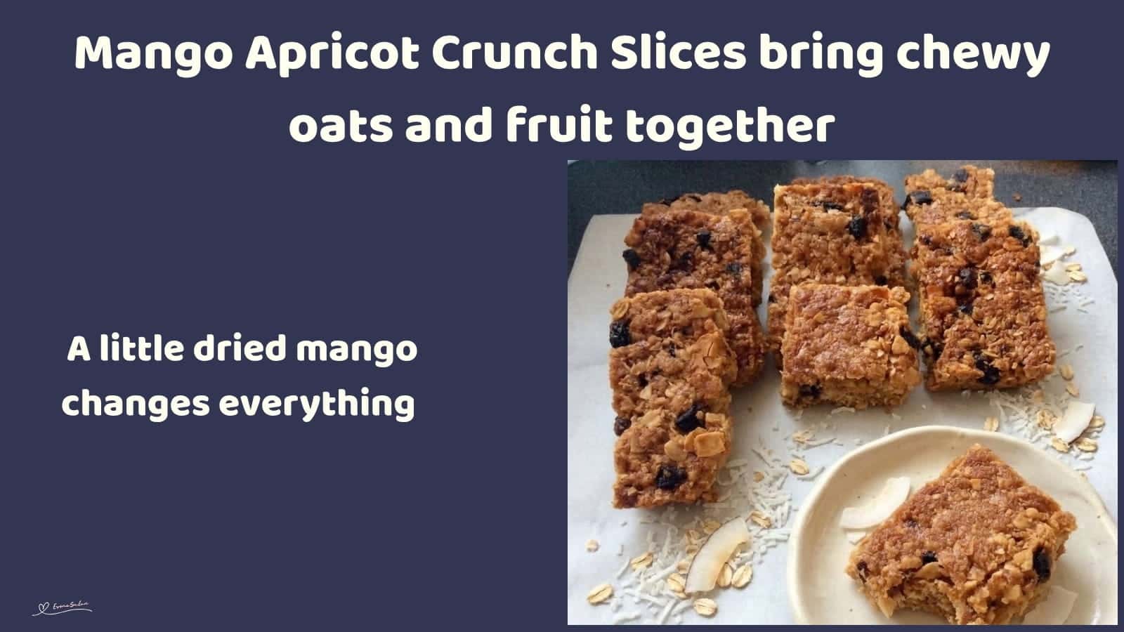 An image of a dish of a tray of Mango Apricot Crunch Slices with almonds, coconut, apricots and mango