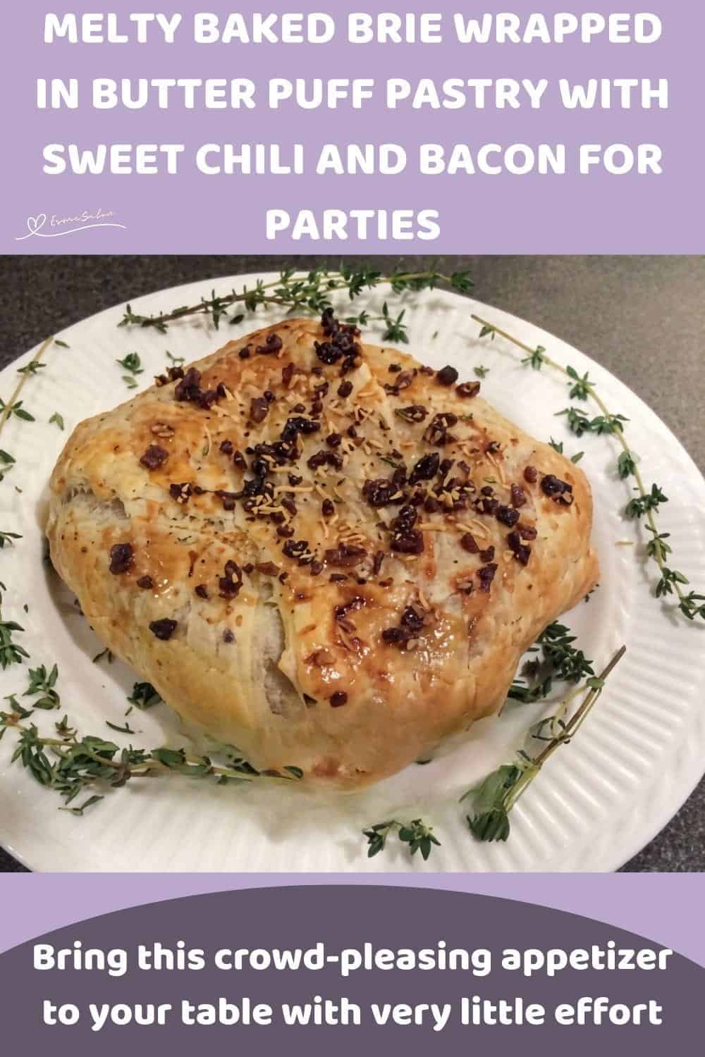 An image of Brie wrapped in Flaky Pastry with chili sauce, bacon bits and parmesan cheese