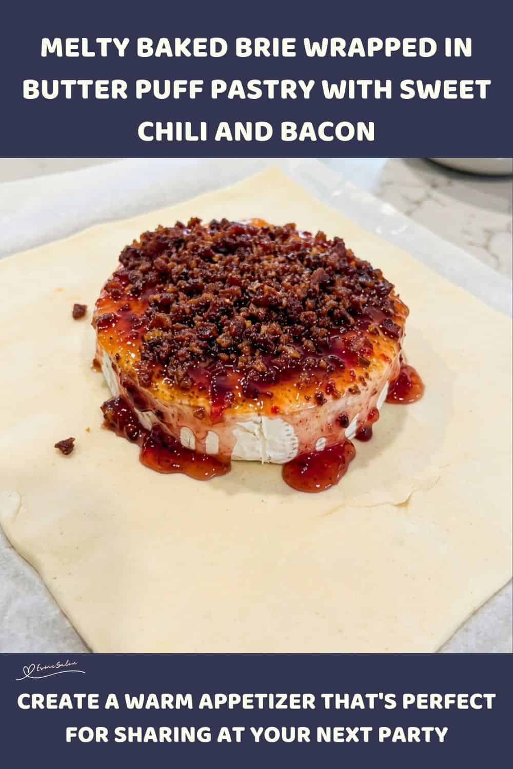 An image of Brie wrapped in Flaky Pastry with chili sauce, bacon bits and parmesan cheese