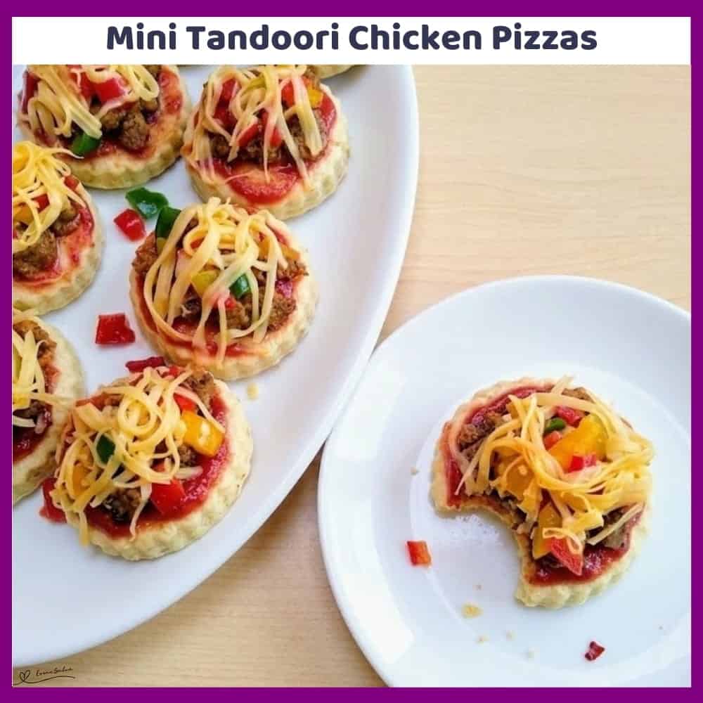 An image of a platter with Mini Chicken Pizzas with bell pepper, tandoori chicken and cheese