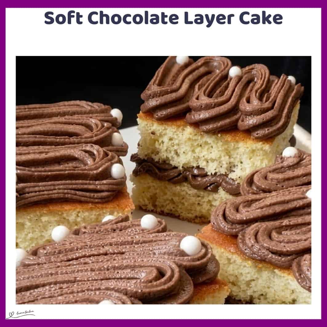 An image of slices of Soft Milk Sponge Cake with Chocolate Icing
