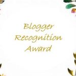 Green, yellow and pink flowers on both sides with overlay ov Blogger Recognition Award
