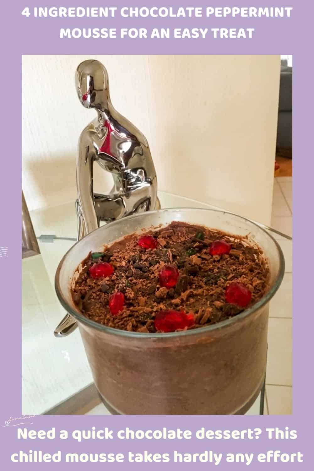 An image of a bowl of Chocolate Peppermint Mousse with instant pudding, cream and Peppermint Crisp