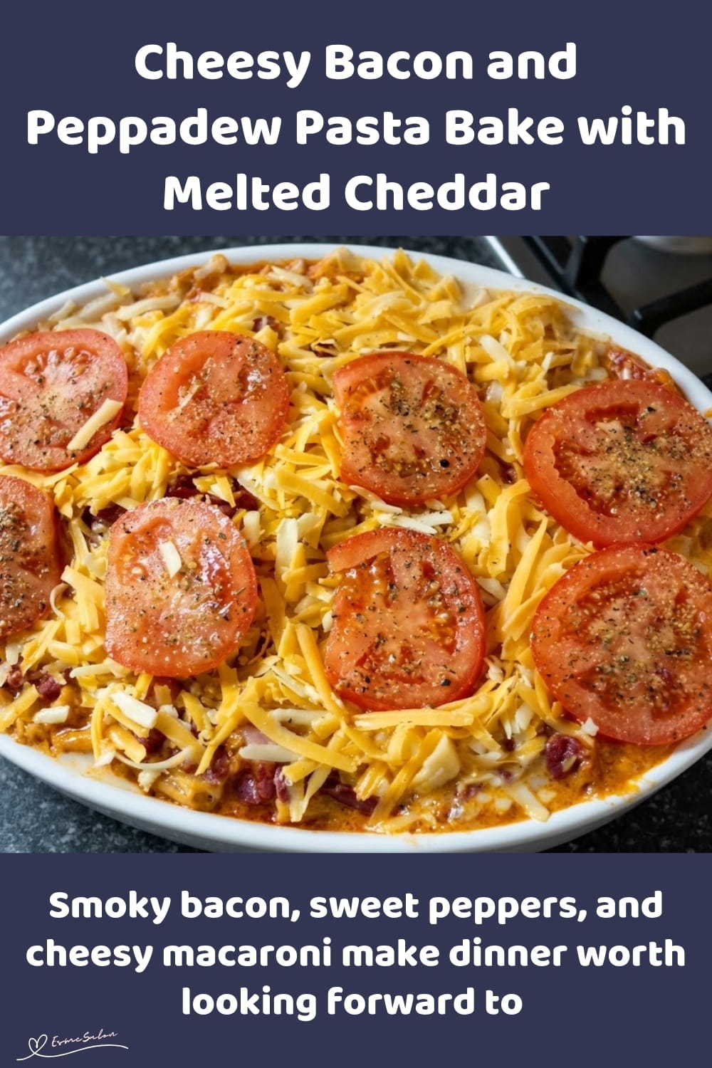 An image of a dish of Cheesy Bacon and Peppadew Pasta Bake with Extra Cheddar and slices of tomato