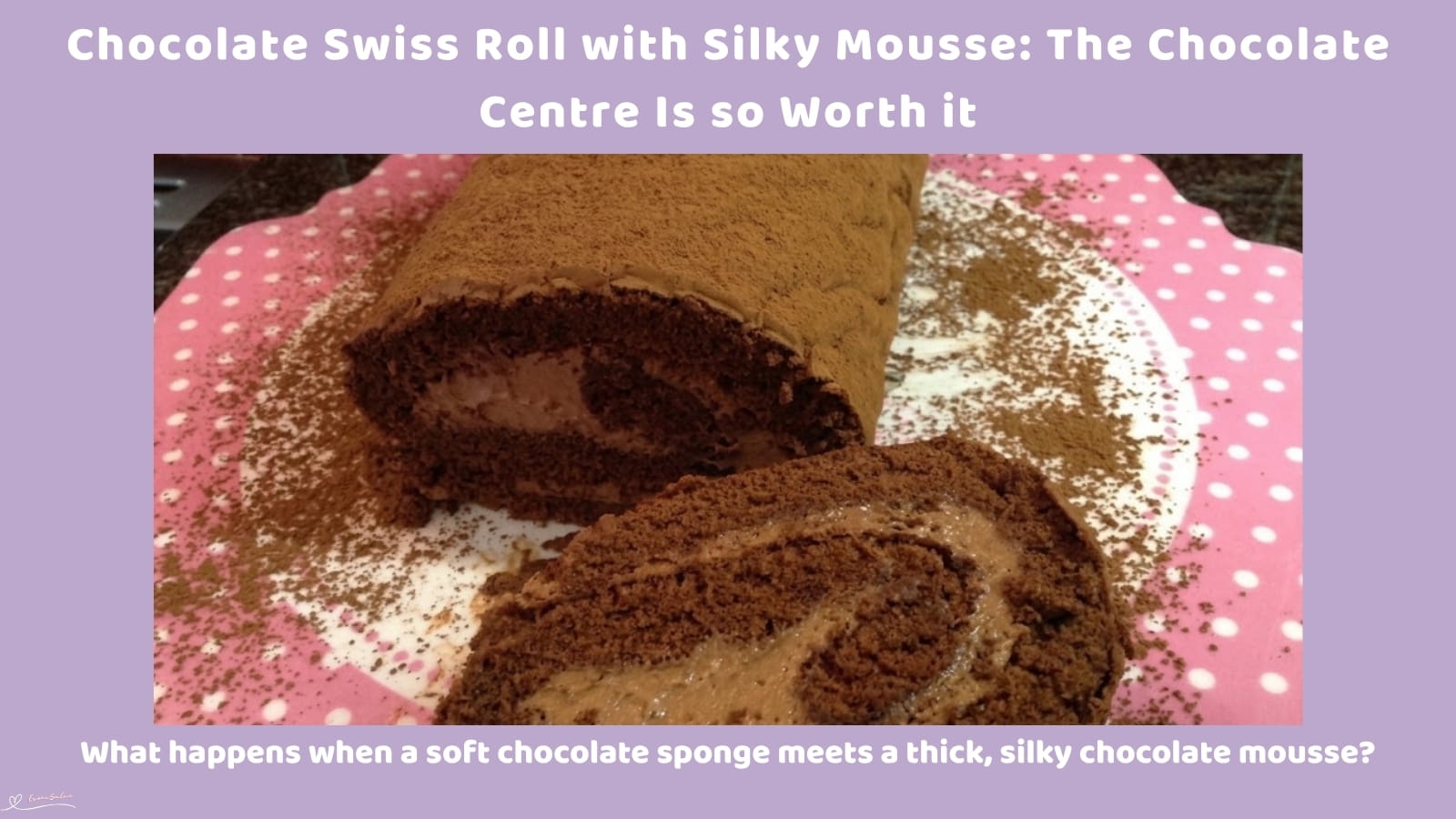 An image of a plate with a Chocolate Swiss Roll, a soft chocolate exterior and a smooth, fluffy Chocolate Mousse filling hidden inside, with a light dusting of cocoa as a finishing touch