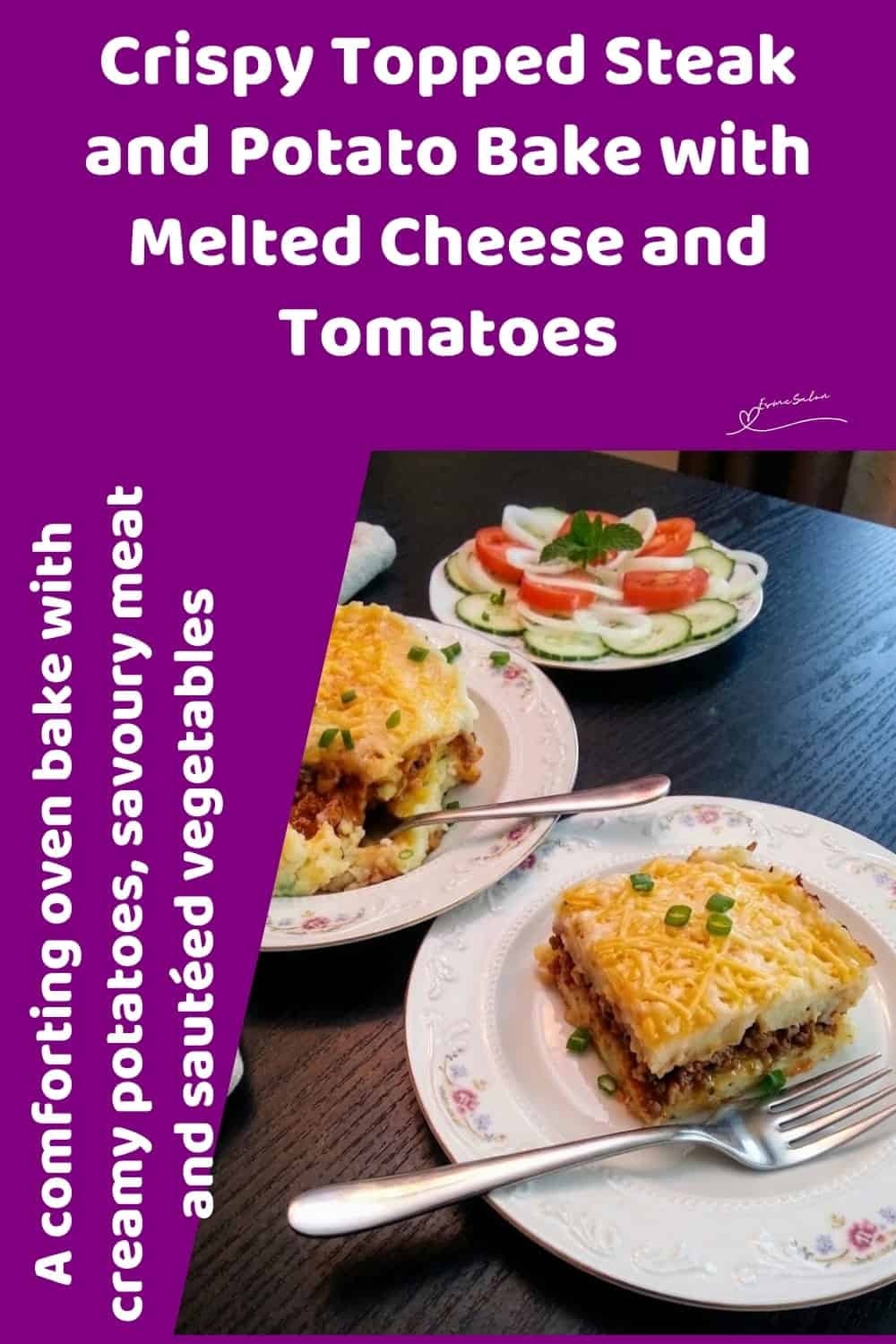 An image of a plate with Crispy Topped Steak and Potato Bake with buttery mashed potatoes with seasoned meat, onions and tomatoes