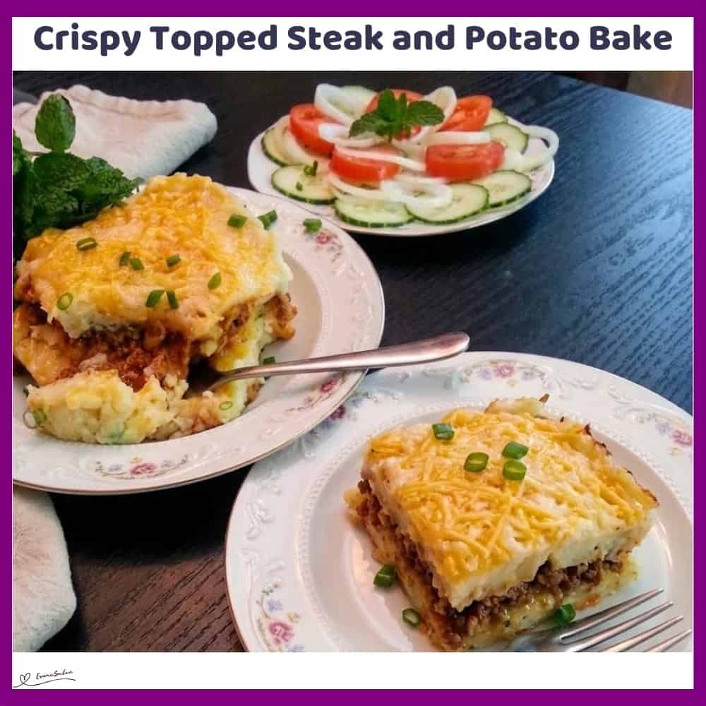An image of a plate with Crispy Topped Steak and Potato Bake with buttery mashed potatoes with seasoned meat, onions and tomatoes