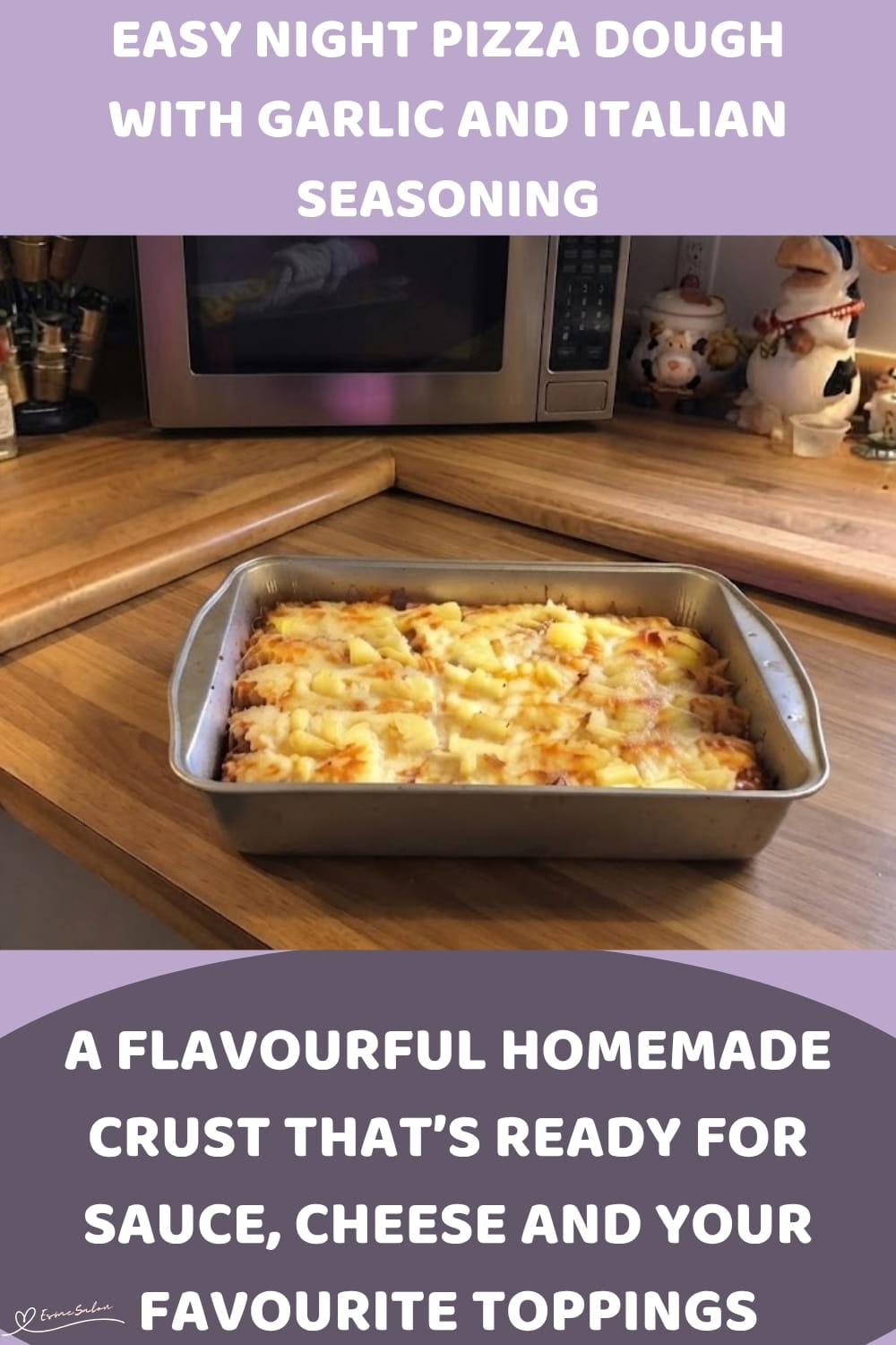 An image of a baking tray with pizza dough, with garlic and Italian seasoning in the dough