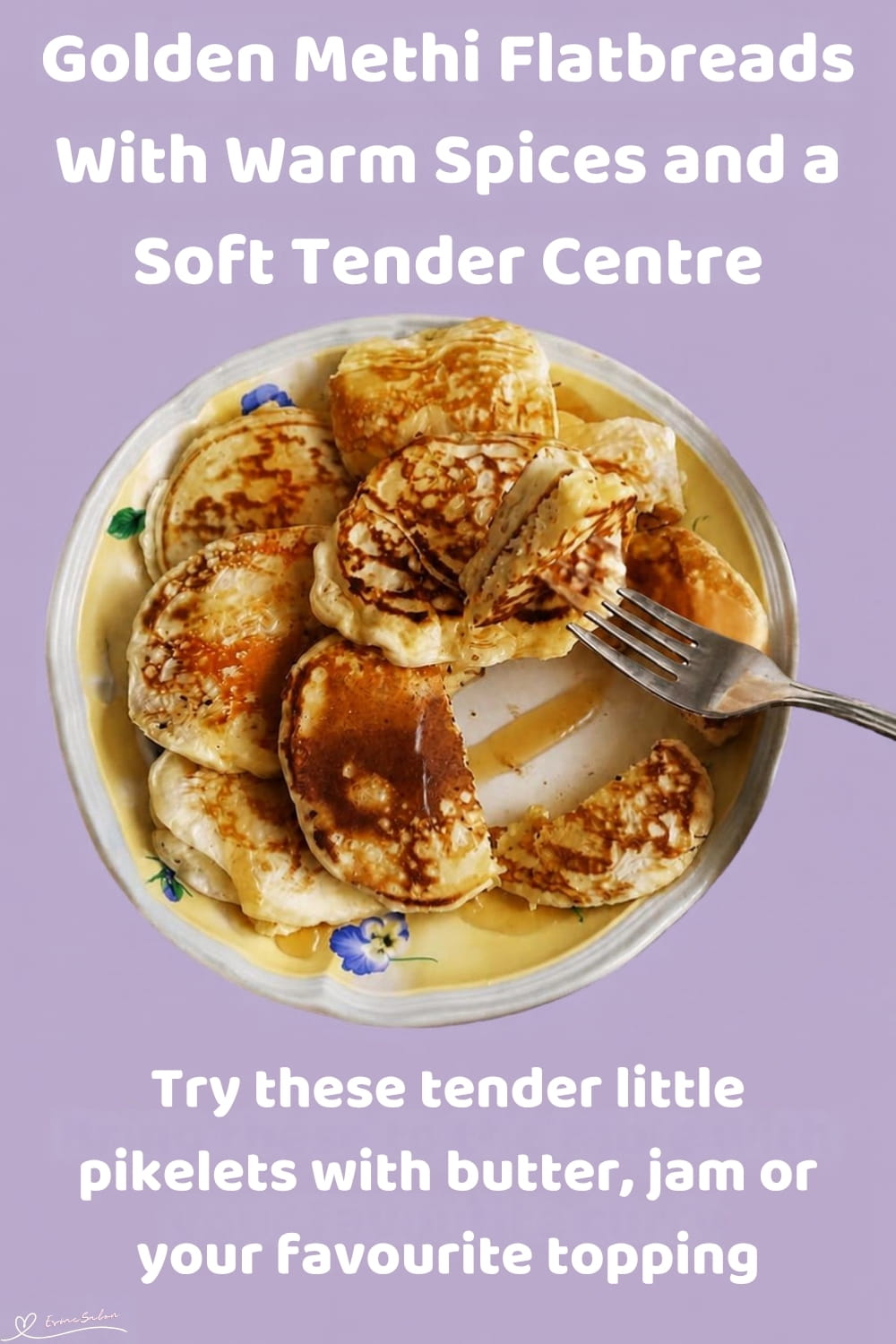 An image of a stack of Fluffy Breakfast Pancakes Pikelets with a bottle of syrup on the side