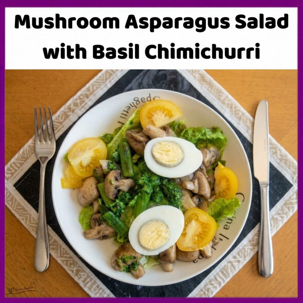 An image of a plate of Keto salad: Portobello mushrooms, fresh asparagus and boiled eggs with a homemade basil dressing