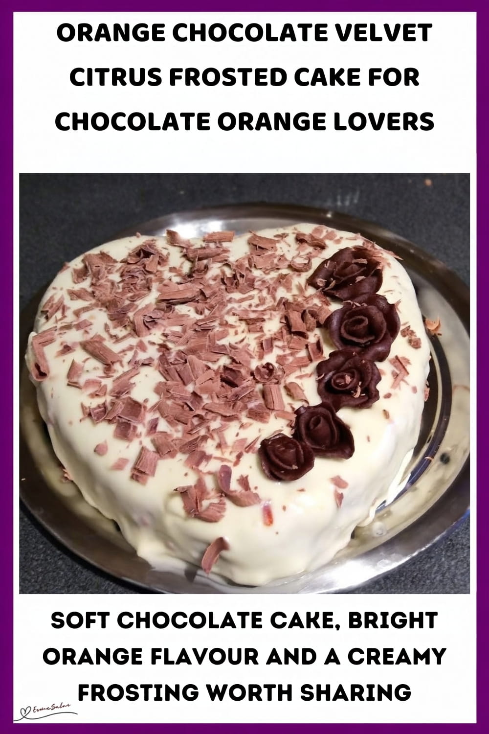 An image of a heart-shaped orange chocolate velvet citrus frosted cake