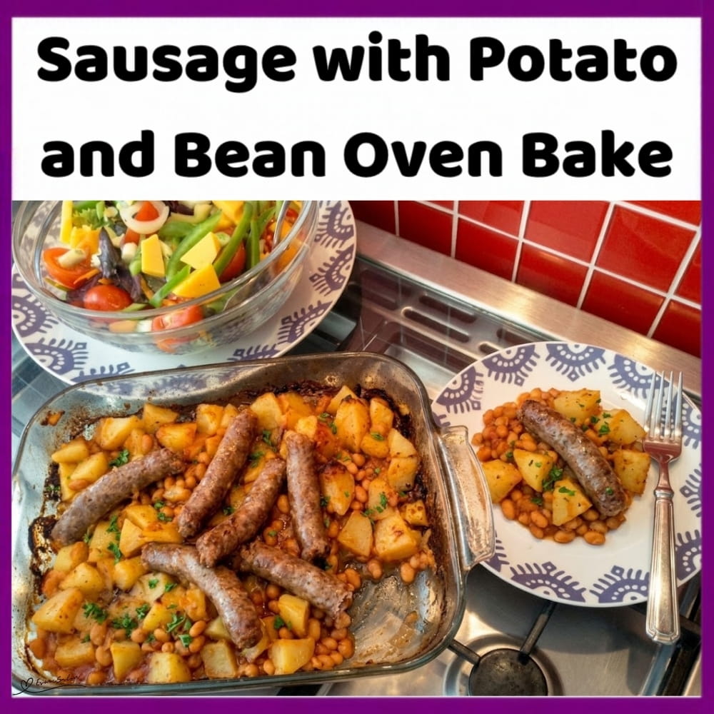 An image of a plate with oven-baked sausage, Potato, baked beans and a side of salad