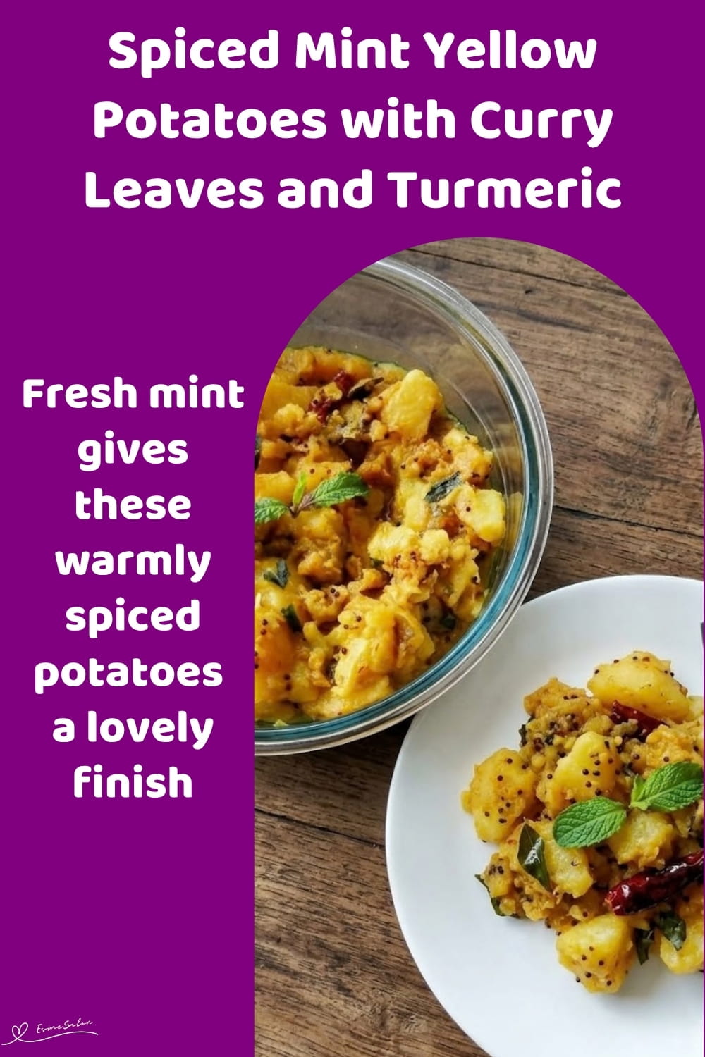 An image of a plate of yellow potatoes with cumin, turmeric and fresh mint
