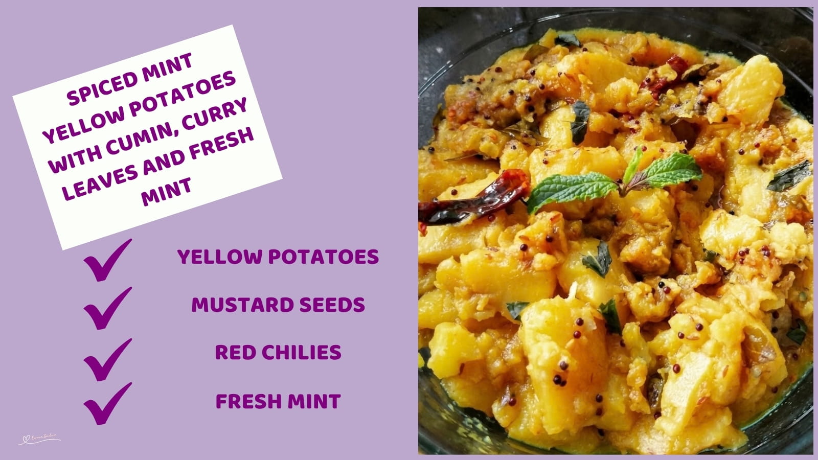 An image of a plate of yellow potatoes with cumin, turmeric and fresh mint