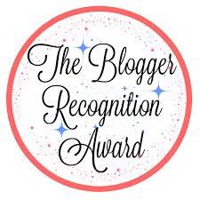 Blogger Recognition Award written in a red circle