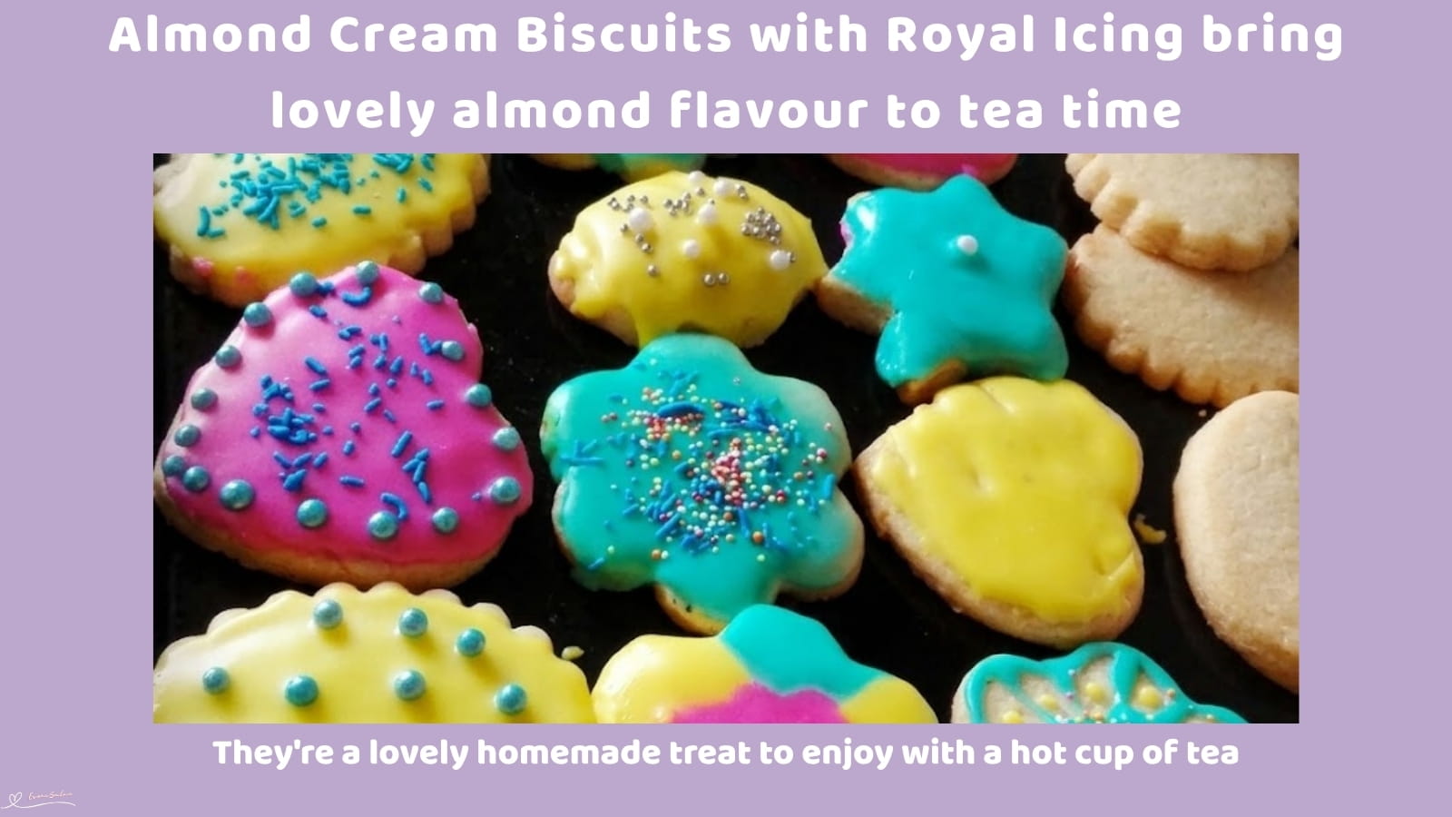 An image of a plate of decorated almond-cut-out buttery biscuits with royal icing, creatively decorated