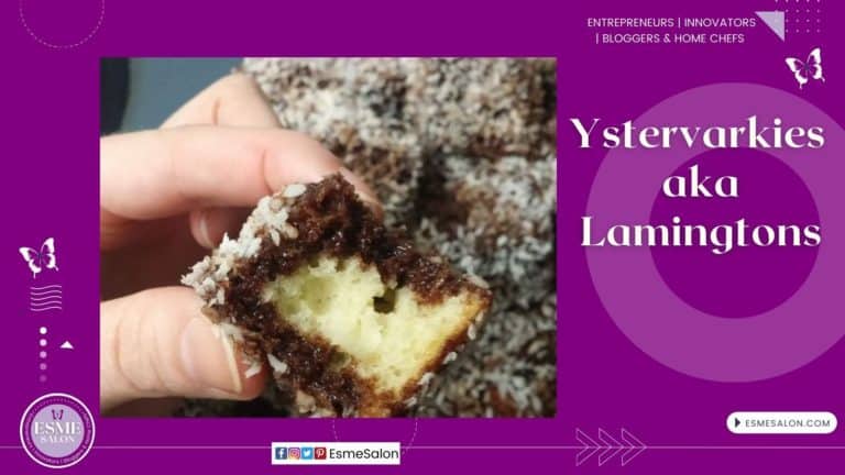 an image of a cube of white cake dipped in chocolate sauce and then in coconut