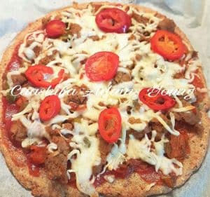 Low Carb Fat Head Dough Pizza is famous in the world of low carb and keto topped with cheese and tomato