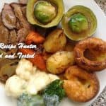 an image of a plated meal of Roast Beef with Yorkshire Pudding