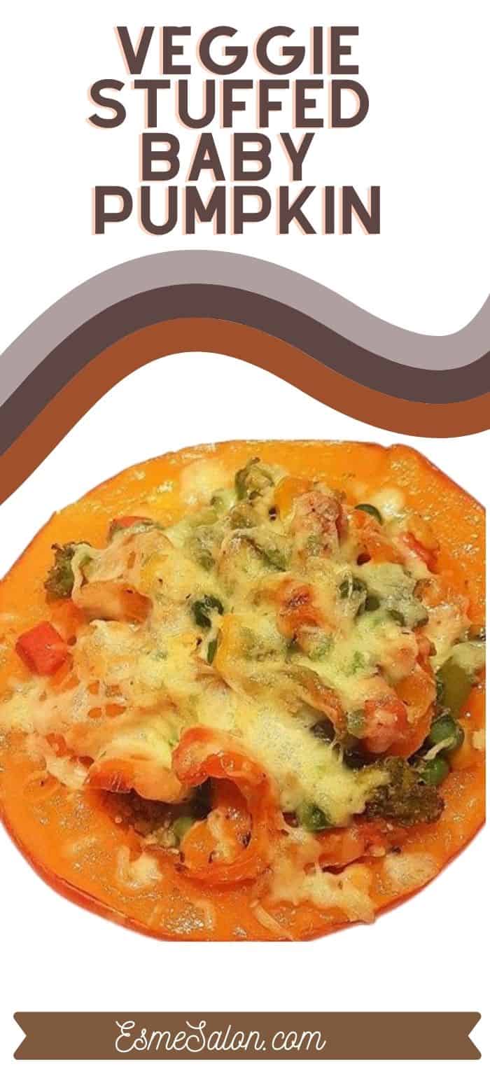 stuffed pumpkin with veggies, peas, carrots and broccoli and topped with melted cheese