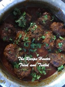 12 Meatballs in a Curry served with dhania