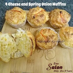 6 Muffins on a wood board, made with 4 different types of cheese