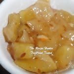 Homemade Mango Chutney in a white dish made with Green under-ripe Mangoes