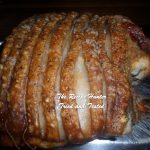 A round Pork cut of meat with Crispy Crackling