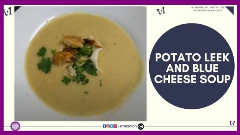 an image of a white bowl filled with Potato Leek and Blue Cheese Soup and croutons