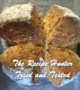 Soda Buttermilk Bread broken into 4 equal portions, nice and golden baked